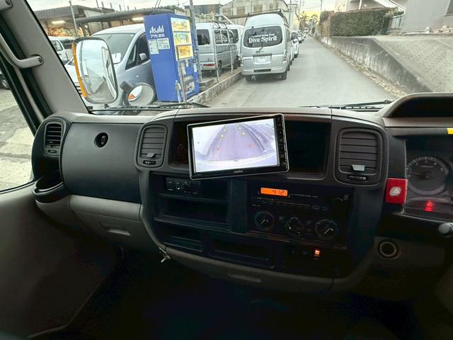 アトラストラック 1.3t パネルバン 法人1オーナー 記録簿 バックカメラ ディーゼルターボ キーレス 上下開き スムーサー6速オートマ 修復歴無し パワーウィンドウ エアコン パワステ 積載量1300kg(10枚目)