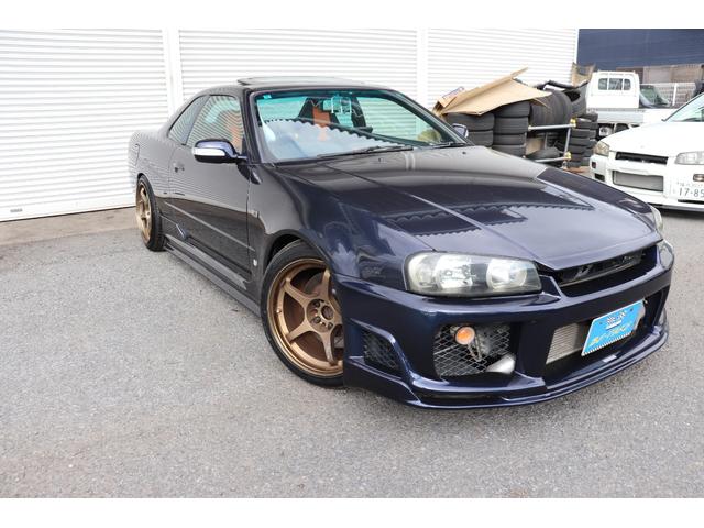 スカイライン ２５ＧＴターボ　トミーカイラフロントバンパー　ＢＮＲ３４純正フロントフェンダー　イーストベアーサイドステップ＆リアバンパー　前後Ｆ５０ブレンボキット　ＨＫＳフロントパイプ　ＪＩＣマフラー　ＴＥＩＮ車高調　クスコＬＳＤ（4枚目）