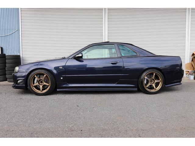 スカイライン ２５ＧＴターボ　トミーカイラフロントバンパー　ＢＮＲ３４純正フロントフェンダー　イーストベアーサイドステップ＆リアバンパー　前後Ｆ５０ブレンボキット　ＨＫＳフロントパイプ　ＪＩＣマフラー　ＴＥＩＮ車高調　クスコＬＳＤ（9枚目）