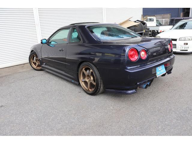 スカイライン ２５ＧＴターボ　トミーカイラフロントバンパー　ＢＮＲ３４純正フロントフェンダー　イーストベアーサイドステップ＆リアバンパー　前後Ｆ５０ブレンボキット　ＨＫＳフロントパイプ　ＪＩＣマフラー　ＴＥＩＮ車高調　クスコＬＳＤ（12枚目）
