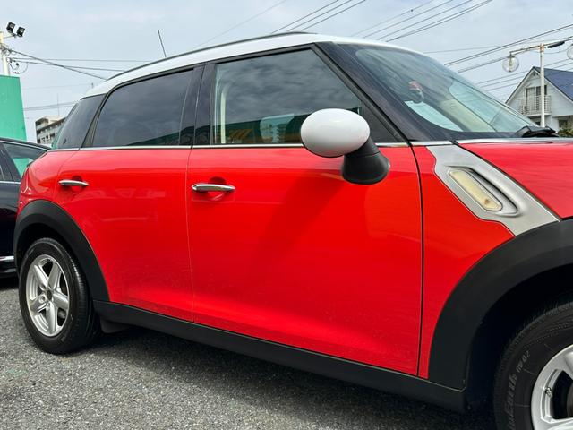 ＭＩＮＩ クーパー　クロスオーバー　ディーラー記録簿付車両　ワンオーナー車　禁煙車　社外黒革調シートカバー　ソニーポータブルナビＴＶ　ＥＴＣ　純正キーレスプッシュスタート　純正１６インチＡＷ　純正ＨＩＤヘッドライト　タイミングチェーン（52枚目）