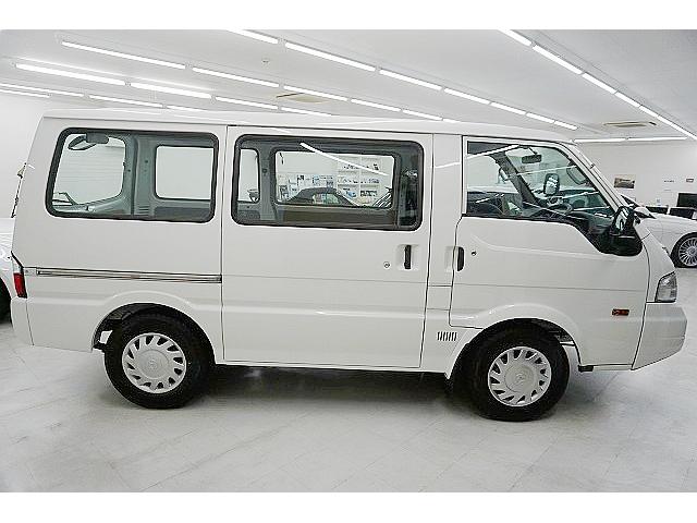 DX 登録済未使用車 新車保証付・R7年7月・10万キロ迄 5ドア・両側スライドドア 5速AT キーレスキー ABS フルリクライニングシート センターコンソール リヤアンダーミラー リアワイパー ラジオ(8枚目)