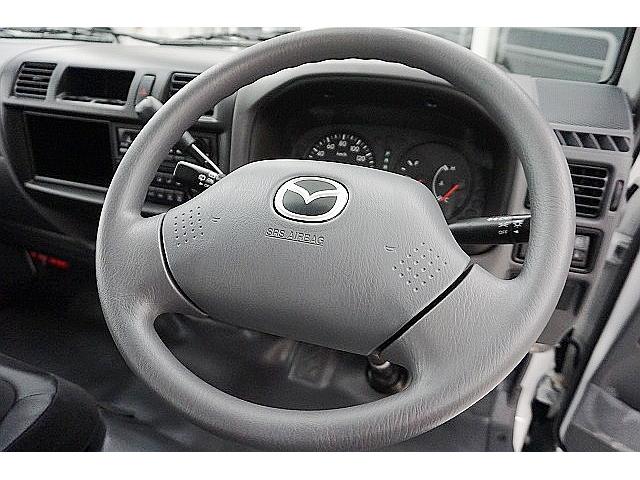 DX 登録済未使用車 新車保証付・R7年7月・10万キロ迄 5ドア・両側スライドドア 5速AT キーレスキー ABS フルリクライニングシート センターコンソール リヤアンダーミラー リアワイパー ラジオ(53枚目)