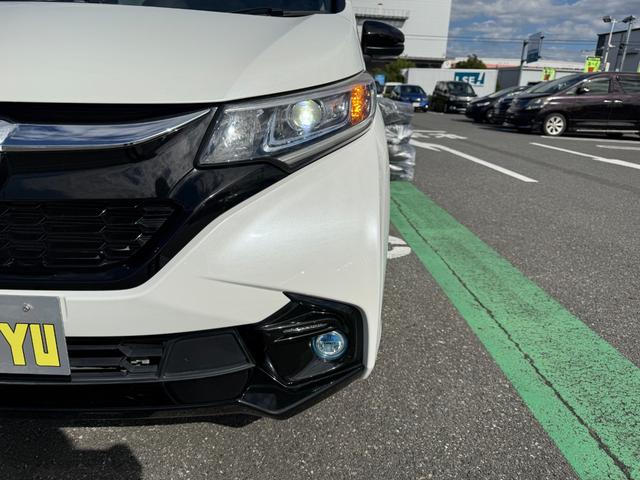 フリードハイブリッド ハイブリッド・モデューロX ホンダセンシング 6人乗り 禁煙1オーナー車 純正9型ナビ 両側電動スライド バックカメラ ETC2.0 衝突軽減装置 車線逸脱警報 Bluetoothオーディオ フルセグTV DVD再生 ハーフレザー 追従クルコン(13枚目)