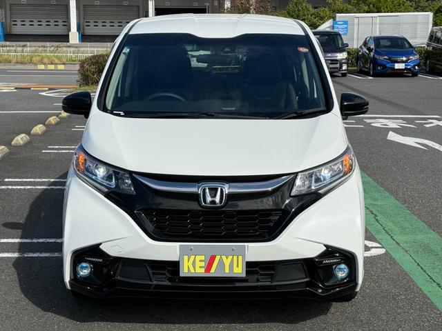 フリードハイブリッド ハイブリッド・モデューロX ホンダセンシング 6人乗り 禁煙1オーナー車 純正9型ナビ 両側電動スライド バックカメラ ETC2.0 衝突軽減装置 車線逸脱警報 Bluetoothオーディオ フルセグTV DVD再生 ハーフレザー 追従クルコン(18枚目)