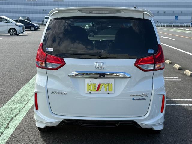 フリードハイブリッド ハイブリッド・モデューロX ホンダセンシング 6人乗り 禁煙1オーナー車 純正9型ナビ 両側電動スライド バックカメラ ETC2.0 衝突軽減装置 車線逸脱警報 Bluetoothオーディオ フルセグTV DVD再生 ハーフレザー 追従クルコン(19枚目)
