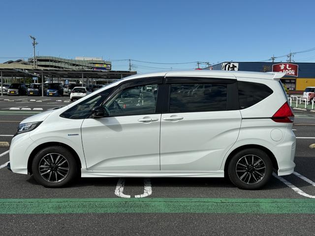 フリードハイブリッド ハイブリッド・モデューロX ホンダセンシング 6人乗り 禁煙1オーナー車 純正9型ナビ 両側電動スライド バックカメラ ETC2.0 衝突軽減装置 車線逸脱警報 Bluetoothオーディオ フルセグTV DVD再生 ハーフレザー 追従クルコン(20枚目)