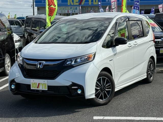 フリードハイブリッド ハイブリッド・モデューロX ホンダセンシング 6人乗り 禁煙1オーナー車 純正9型ナビ 両側電動スライド バックカメラ ETC2.0 衝突軽減装置 車線逸脱警報 Bluetoothオーディオ フルセグTV DVD再生 ハーフレザー 追従クルコン(22枚目)