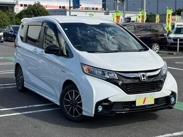 フリードハイブリッド ハイブリッド・モデューロX ホンダセンシング 6人乗り 禁煙1オーナー車 純正9型ナビ 両側電動スライド バックカメラ ETC2.0 衝突軽減装置 車線逸脱警報 Bluetoothオーディオ フルセグTV DVD再生 ハーフレザー 追従クルコン(24枚目)