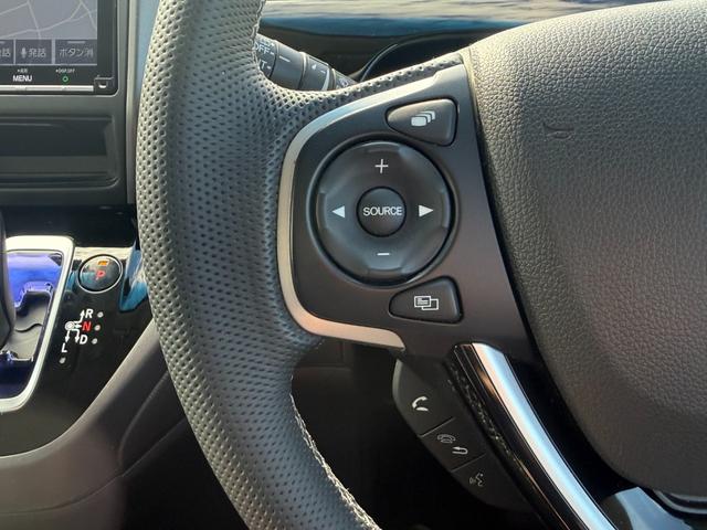 フリードハイブリッド ハイブリッド・モデューロX ホンダセンシング 6人乗り 禁煙1オーナー車 純正9型ナビ 両側電動スライド バックカメラ ETC2.0 衝突軽減装置 車線逸脱警報 Bluetoothオーディオ フルセグTV DVD再生 ハーフレザー 追従クルコン(32枚目)