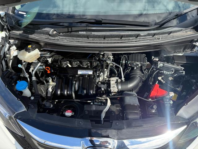 フリードハイブリッド ハイブリッド・モデューロX ホンダセンシング 6人乗り 禁煙1オーナー車 純正9型ナビ 両側電動スライド バックカメラ ETC2.0 衝突軽減装置 車線逸脱警報 Bluetoothオーディオ フルセグTV DVD再生 ハーフレザー 追従クルコン(42枚目)