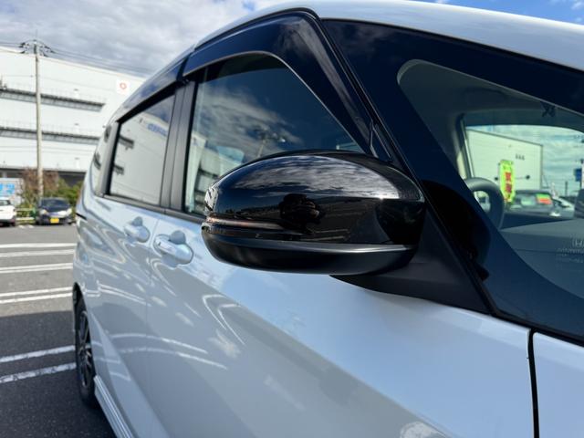 フリードハイブリッド ハイブリッド・モデューロX ホンダセンシング 6人乗り 禁煙1オーナー車 純正9型ナビ 両側電動スライド バックカメラ ETC2.0 衝突軽減装置 車線逸脱警報 Bluetoothオーディオ フルセグTV DVD再生 ハーフレザー 追従クルコン(43枚目)