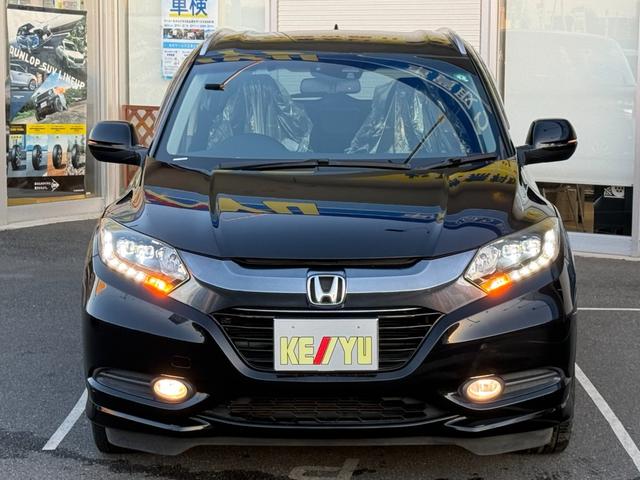 ヴェゼル ハイブリッドＺ　禁煙車　純正８型ナビ　バックカメラ　ＥＴＣ　衝突軽減装置　Ｂｌｕｅｔｏｏｔｈオーディオ　フルセグＴＶ　ＤＶＤ再生　ＬＥＤヘッドライト　ハーフレザー　シートヒーター　クルコン　パドルシフト　純正アルミ（18枚目）