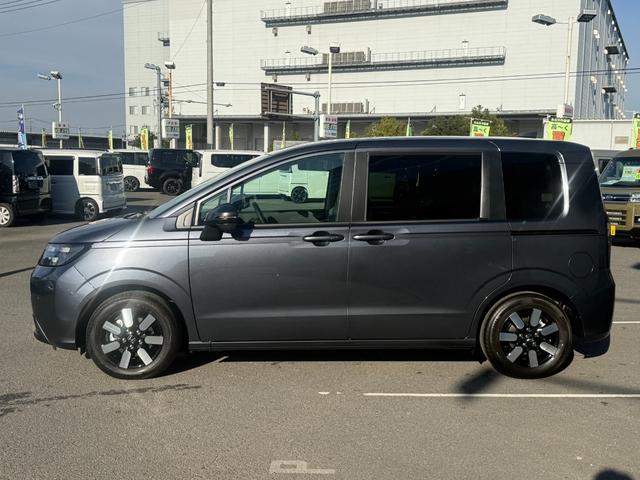 フリード ｅ：ＨＥＶエアー　ＥＸ　登録済未使用車　全方位カメラ　純正１１．４型ナビ　ＥＴＣ２．０　ＢＳＩ・後退出庫サポート　アダプティブドライビングビーム　両側電動スライド　シートヒーター　リアクーラー　パーキングセンサー　専用アルミ（20枚目）