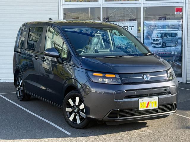 フリード ｅ：ＨＥＶエアー　ＥＸ　登録済未使用車　全方位カメラ　純正１１．４型ナビ　ＥＴＣ２．０　ＢＳＩ・後退出庫サポート　アダプティブドライビングビーム　両側電動スライド　シートヒーター　リアクーラー　パーキングセンサー　専用アルミ（24枚目）