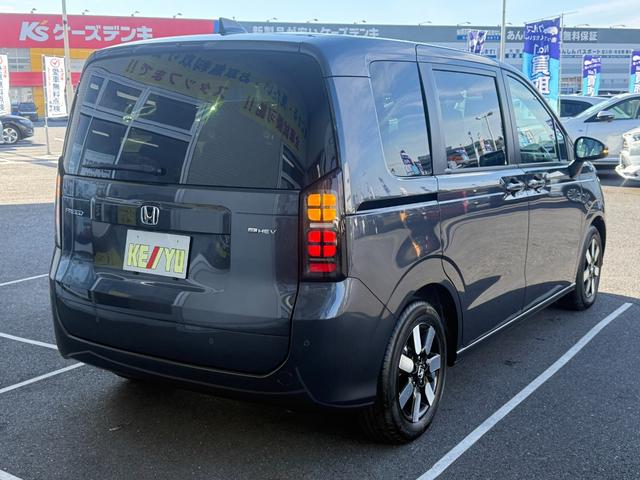 フリード ｅ：ＨＥＶエアー　ＥＸ　登録済未使用車　全方位カメラ　純正１１．４型ナビ　ＥＴＣ２．０　ＢＳＩ・後退出庫サポート　アダプティブドライビングビーム　両側電動スライド　シートヒーター　リアクーラー　パーキングセンサー　専用アルミ（25枚目）