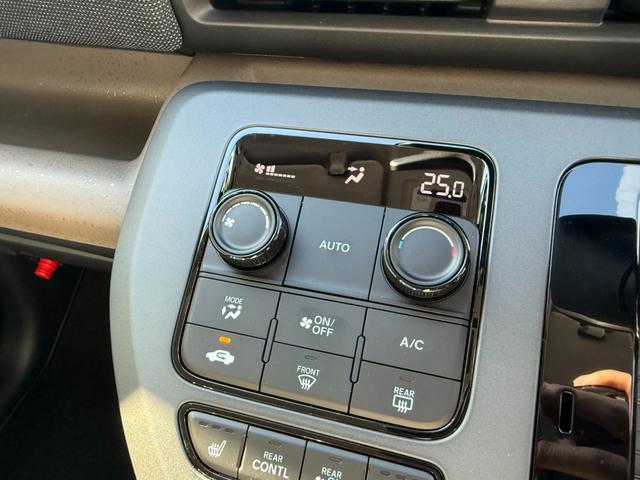 フリード ｅ：ＨＥＶエアー　ＥＸ　登録済未使用車　全方位カメラ　純正１１．４型ナビ　ＥＴＣ２．０　ＢＳＩ・後退出庫サポート　アダプティブドライビングビーム　両側電動スライド　シートヒーター　リアクーラー　パーキングセンサー　専用アルミ（35枚目）