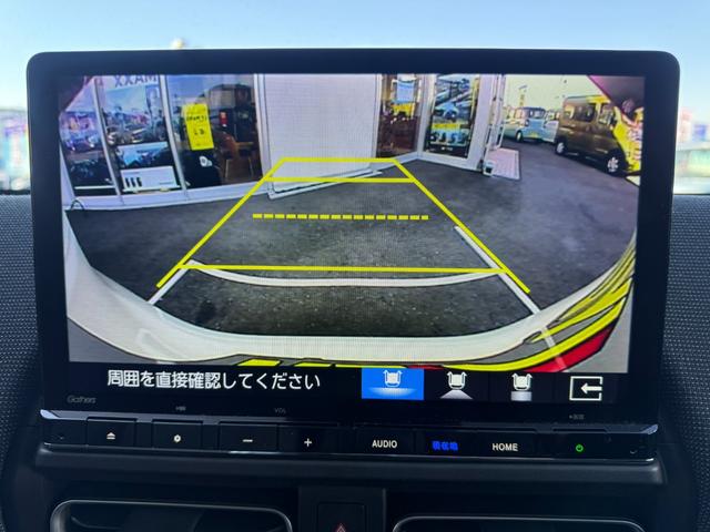 フリード ｅ：ＨＥＶエアー　ＥＸ　禁煙　純正１１．４型ナビ　両側電動スライド　バックカメラ　ＥＴＣ２．０　ＢＳＭ　衝突軽減装置　車線逸脱警報　コーナーセンサー　Ｂｌｕｅｔｏｏｔｈオーディオ　フルセグＴＶ　ＤＶＤ再生　ＬＥＤヘッドライト（8枚目）