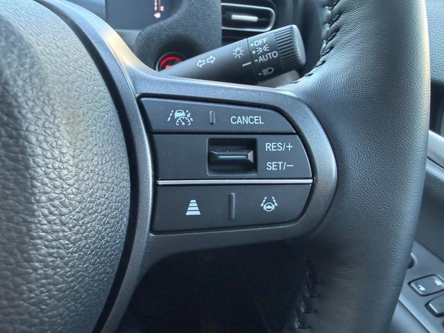 フリード ｅ：ＨＥＶエアー　ＥＸ　禁煙　純正１１．４型ナビ　両側電動スライド　バックカメラ　ＥＴＣ２．０　ＢＳＭ　衝突軽減装置　車線逸脱警報　コーナーセンサー　Ｂｌｕｅｔｏｏｔｈオーディオ　フルセグＴＶ　ＤＶＤ再生　ＬＥＤヘッドライト（11枚目）