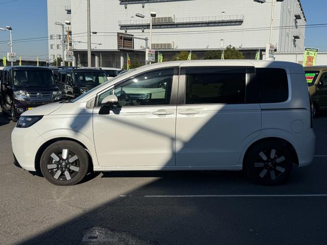 フリード ｅ：ＨＥＶエアー　ＥＸ　禁煙　純正１１．４型ナビ　両側電動スライド　バックカメラ　ＥＴＣ２．０　ＢＳＭ　衝突軽減装置　車線逸脱警報　コーナーセンサー　Ｂｌｕｅｔｏｏｔｈオーディオ　フルセグＴＶ　ＤＶＤ再生　ＬＥＤヘッドライト（20枚目）