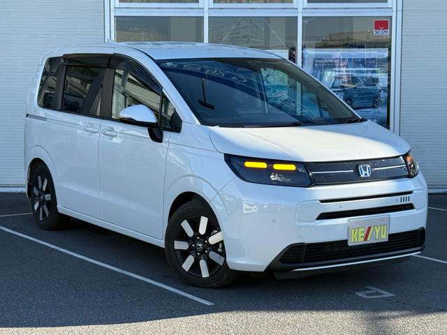 フリード ｅ：ＨＥＶエアー　ＥＸ　禁煙　純正１１．４型ナビ　両側電動スライド　バックカメラ　ＥＴＣ２．０　ＢＳＭ　衝突軽減装置　車線逸脱警報　コーナーセンサー　Ｂｌｕｅｔｏｏｔｈオーディオ　フルセグＴＶ　ＤＶＤ再生　ＬＥＤヘッドライト（24枚目）