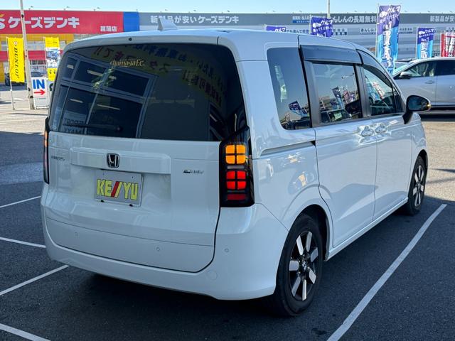 フリード ｅ：ＨＥＶエアー　ＥＸ　禁煙　純正１１．４型ナビ　両側電動スライド　バックカメラ　ＥＴＣ２．０　ＢＳＭ　衝突軽減装置　車線逸脱警報　コーナーセンサー　Ｂｌｕｅｔｏｏｔｈオーディオ　フルセグＴＶ　ＤＶＤ再生　ＬＥＤヘッドライト（25枚目）