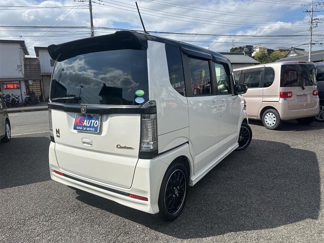 Ｎ－ＢＯＸカスタム ２トーンカラースタイル　Ｇ・ターボＬパッケージ　エアコン　パワーウインドウ　パワーステアリング　運転席　助手席エアバック　ナビ　ＥＴＣ　バックカメラ　両側電動スライドドア　ＨＩＤ　ターボ車　車検２年付き（5枚目）