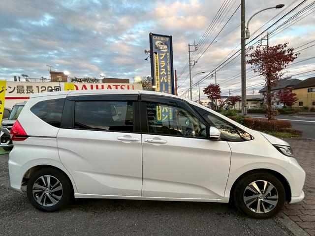 フリード Ｇ・ホンダセンシング　純正ナビ／ＴＶ／バックカメラ／ドラレコ／ＥＴＣ／両側電動スライド／ＬＥＤヘッドライト／ＤＶＤ・ＣＤ／Ｂｌｕｅｔｏｏｔｈ／オートリトラミラー／アクティブコーナーリングライト／スマートキー（7枚目）