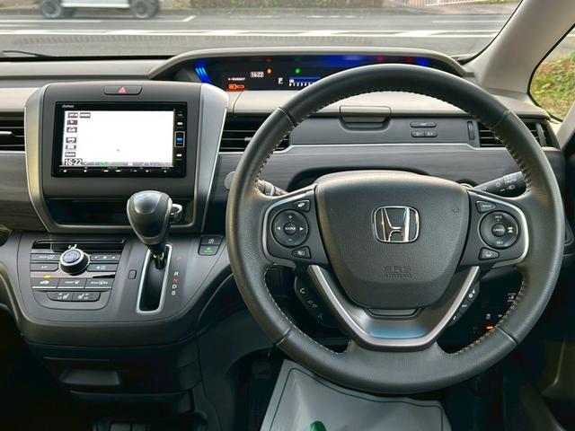 フリード Ｇ・ホンダセンシング　純正ナビ／ＴＶ／バックカメラ／ドラレコ／ＥＴＣ／両側電動スライド／ＬＥＤヘッドライト／ＤＶＤ・ＣＤ／Ｂｌｕｅｔｏｏｔｈ／オートリトラミラー／アクティブコーナーリングライト／スマートキー（9枚目）