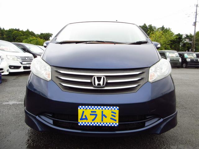 フリード Ｇ　エアロ　ジャストセレクション　７人乗り　ナビ　テレビ　ＥＴＣ　Ｂカメラ　左パワースライドドア　純正エアロ　純正アルミ　ＨＩＤオートライト　オートエアコン　ステアリモコン　キーレスキー　プライバシーガラス　取説　保証書（3枚目）