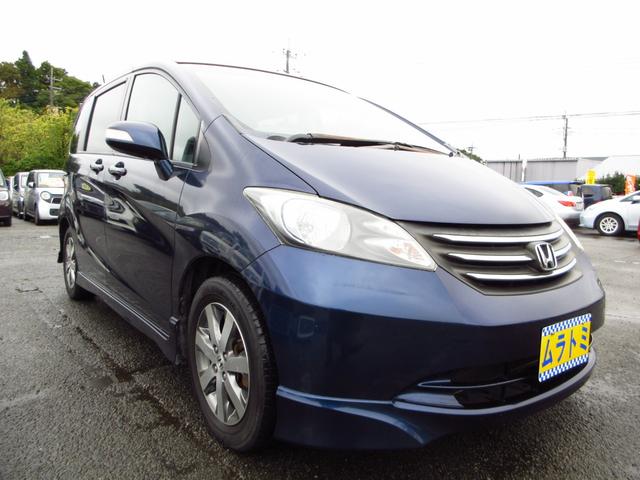 フリード Ｇ　エアロ　ジャストセレクション　７人乗り　ナビ　テレビ　ＥＴＣ　Ｂカメラ　左パワースライドドア　純正エアロ　純正アルミ　ＨＩＤオートライト　オートエアコン　ステアリモコン　キーレスキー　プライバシーガラス　取説　保証書（10枚目）