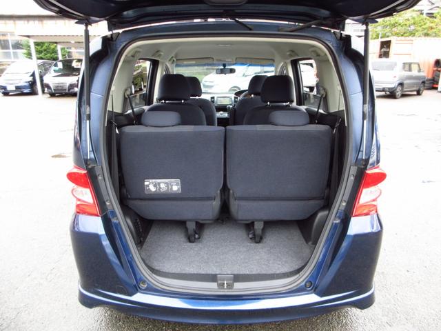 フリード Ｇ　エアロ　ジャストセレクション　７人乗り　ナビ　テレビ　ＥＴＣ　Ｂカメラ　左パワースライドドア　純正エアロ　純正アルミ　ＨＩＤオートライト　オートエアコン　ステアリモコン　キーレスキー　プライバシーガラス　取説　保証書（32枚目）