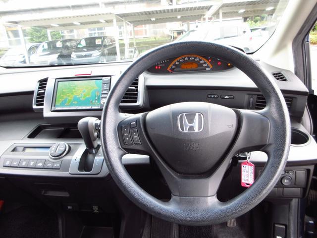 フリード Ｇ　エアロ　ジャストセレクション　７人乗り　ナビ　テレビ　ＥＴＣ　Ｂカメラ　左パワースライドドア　純正エアロ　純正アルミ　ＨＩＤオートライト　オートエアコン　ステアリモコン　キーレスキー　プライバシーガラス　取説　保証書（38枚目）