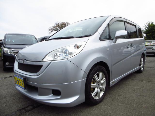 ステップワゴン G Lパッケージ フローリングフロア 8人乗り ナビ CD DVD ETC Bカメラ 両側パワースライドドア 純正フルエアロ 純正アルミ 社外マフラー HID シートカバー オート電格ミラー キーレス ステアリモコン(4枚目)