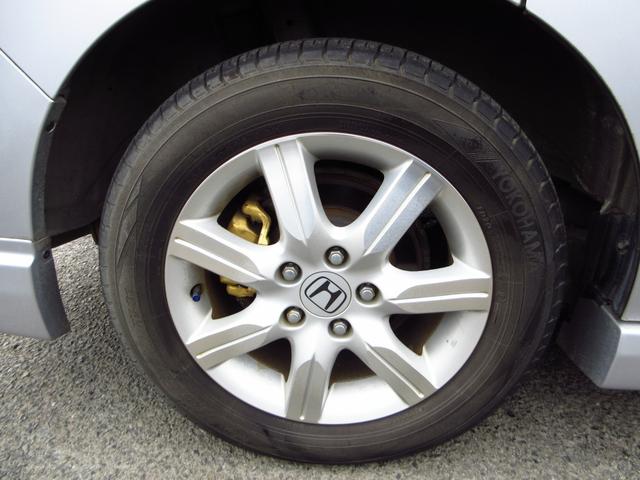 ステップワゴン G Lパッケージ フローリングフロア 8人乗り ナビ CD DVD ETC Bカメラ 両側パワースライドドア 純正フルエアロ 純正アルミ 社外マフラー HID シートカバー オート電格ミラー キーレス ステアリモコン(8枚目)