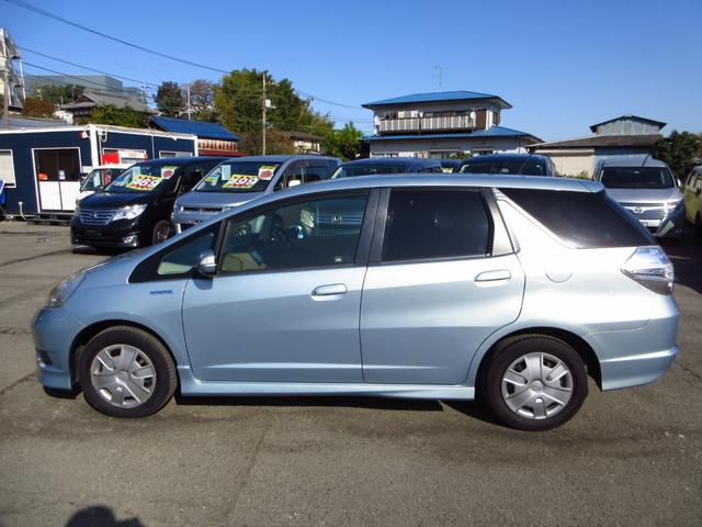 フィットシャトルハイブリッド ハイブリッド・スマートセレクション コンビシート ナビ テレビ ETC Bカメラ クルーズコントロール スマートキー 助手席回転シート 革巻きステアリング HIDオートライト フォグ オートエアコン ステアリモコン ECON 保証書(5枚目)