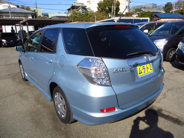 フィットシャトルハイブリッド ハイブリッド・スマートセレクション コンビシート ナビ テレビ ETC Bカメラ クルーズコントロール スマートキー 助手席回転シート 革巻きステアリング HIDオートライト フォグ オートエアコン ステアリモコン ECON 保証書(6枚目)