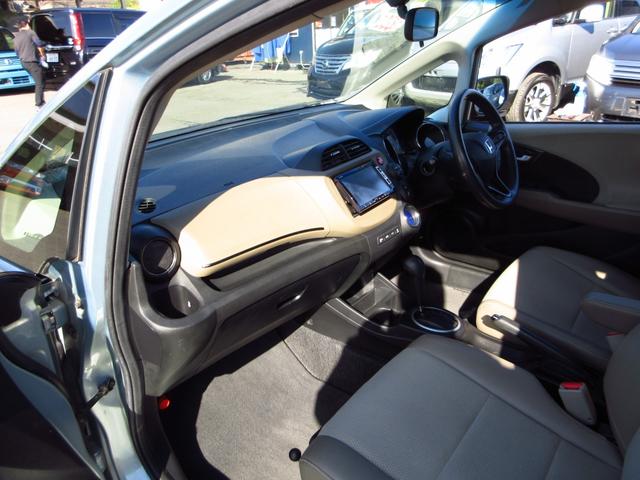 フィットシャトルハイブリッド ハイブリッド・スマートセレクション コンビシート ナビ テレビ ETC Bカメラ クルーズコントロール スマートキー 助手席回転シート 革巻きステアリング HIDオートライト フォグ オートエアコン ステアリモコン ECON 保証書(27枚目)