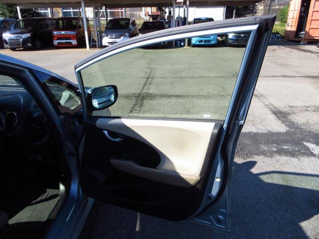 フィットシャトルハイブリッド ハイブリッド・スマートセレクション コンビシート ナビ テレビ ETC Bカメラ クルーズコントロール スマートキー 助手席回転シート 革巻きステアリング HIDオートライト フォグ オートエアコン ステアリモコン ECON 保証書(52枚目)