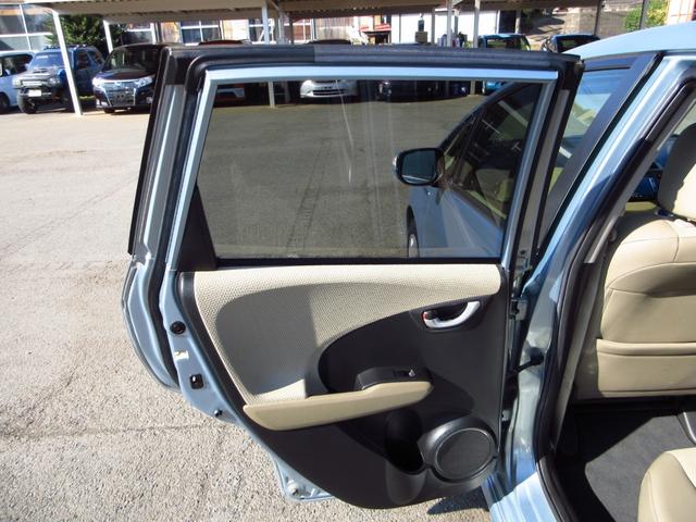 フィットシャトルハイブリッド ハイブリッド・スマートセレクション コンビシート ナビ テレビ ETC Bカメラ クルーズコントロール スマートキー 助手席回転シート 革巻きステアリング HIDオートライト フォグ オートエアコン ステアリモコン ECON 保証書(55枚目)