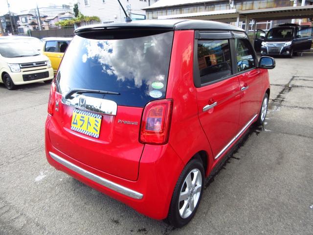 N-ONE プレミアム ツアラー・Lパッケージ ターボ ツートンカラー ディスプレイオーディオ HDMI CD Bカメラ 革巻きステアリング 純正アルミ リアスポイラー HIDオートライト フォグ スマートキー オートエアコン カーテンエアバッグ(8枚目)