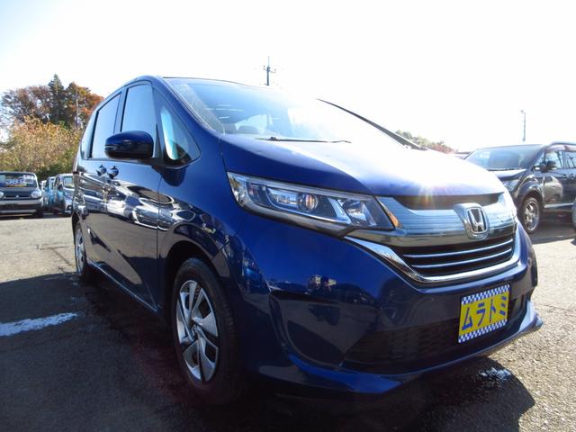 フリードハイブリッド ハイブリッド・Ｇホンダセンシング　雹害車　６人乗り　ナビ　ブルートゥース　ＥＴＣ　Ｂカメラ　両側パワースライドドア　衝突軽減ブレーキ　クルーズコントロール　ＬＥＤオートライト　リアシェード　スマートキー　ステアリモコン　保証書（8枚目）