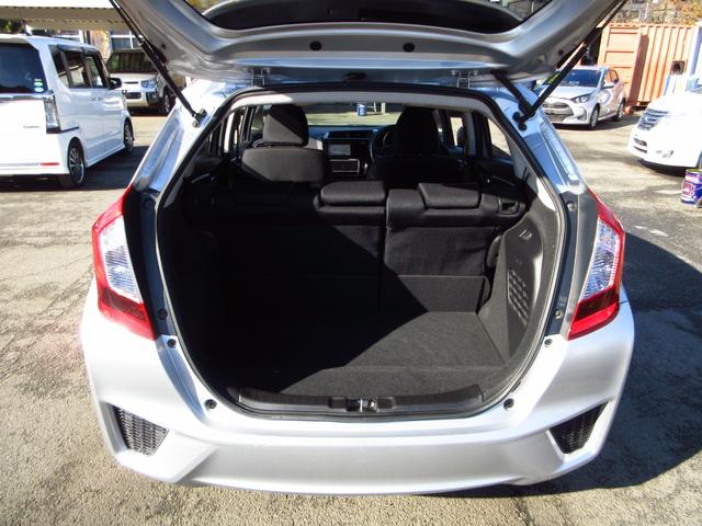 フィットハイブリッド Ｆパッケージ　ナビ　フルセグ　ＣＤ　ＤＶＤ　ＨＤＭＩ　ＵＳＢ　ビルトインＥＴＣ　Ｂカメラ　スマートキー　アイドリングストップ　ＥＣＯＮ　ステアリモコン　オートエアコン　プッシュスタート　ドアバイザー　保証書（30枚目）