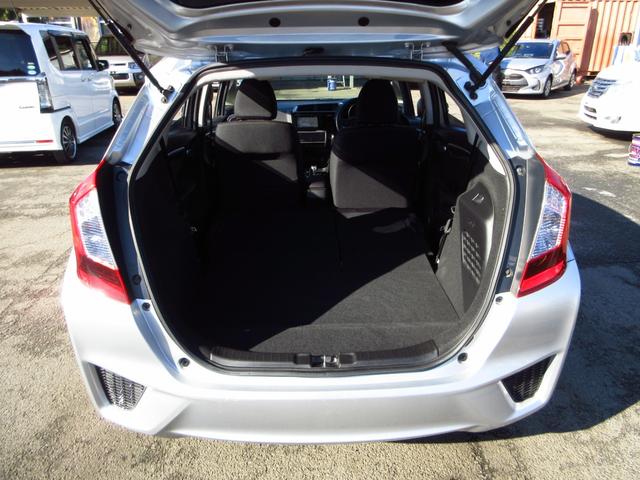 フィットハイブリッド Ｆパッケージ　ナビ　フルセグ　ＣＤ　ＤＶＤ　ＨＤＭＩ　ＵＳＢ　ビルトインＥＴＣ　Ｂカメラ　スマートキー　アイドリングストップ　ＥＣＯＮ　ステアリモコン　オートエアコン　プッシュスタート　ドアバイザー　保証書（31枚目）