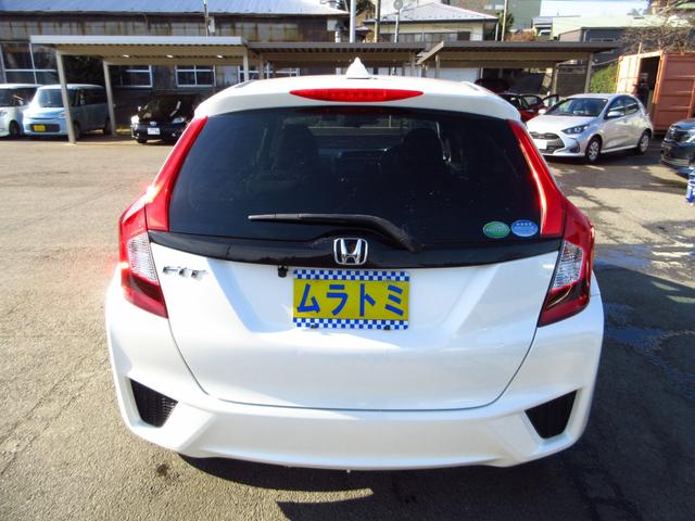 フィット 13G・Fパッケージ 5速マニュアル ナビ ブルートゥース ETC Bカメラ 前後ドライブレコーダー スマートキー アイストップ 社外アルミ CTBA ドアバイザー プライバシーガラス カーテンエアバッグ 保証書(9枚目)