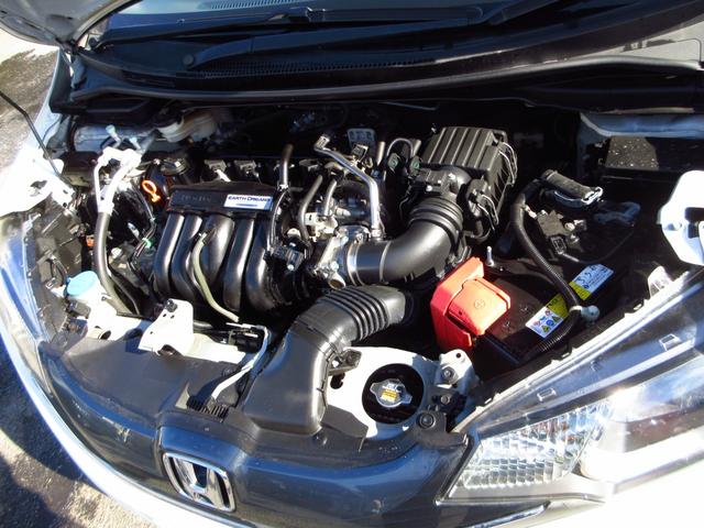 フィット 13G・Fパッケージ 5速マニュアル ナビ ブルートゥース ETC Bカメラ 前後ドライブレコーダー スマートキー アイストップ 社外アルミ CTBA ドアバイザー プライバシーガラス カーテンエアバッグ 保証書(12枚目)