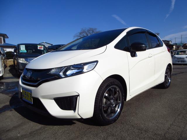 フィット 13G・Fパッケージ 5速マニュアル ナビ ブルートゥース ETC Bカメラ 前後ドライブレコーダー スマートキー アイストップ 社外アルミ CTBA ドアバイザー プライバシーガラス カーテンエアバッグ 保証書(17枚目)