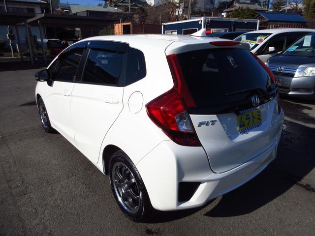 フィット 13G・Fパッケージ 5速マニュアル ナビ ブルートゥース ETC Bカメラ 前後ドライブレコーダー スマートキー アイストップ 社外アルミ CTBA ドアバイザー プライバシーガラス カーテンエアバッグ 保証書(18枚目)