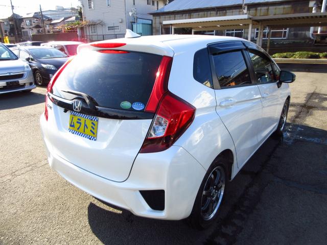 フィット 13G・Fパッケージ 5速マニュアル ナビ ブルートゥース ETC Bカメラ 前後ドライブレコーダー スマートキー アイストップ 社外アルミ CTBA ドアバイザー プライバシーガラス カーテンエアバッグ 保証書(19枚目)