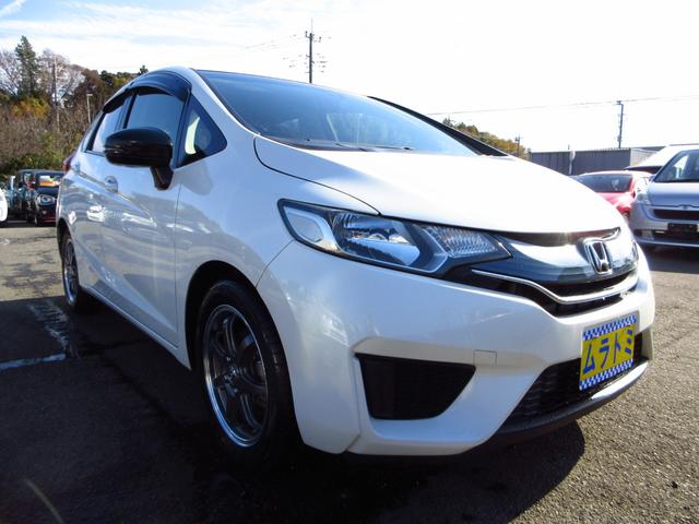 フィット 13G・Fパッケージ 5速マニュアル ナビ ブルートゥース ETC Bカメラ 前後ドライブレコーダー スマートキー アイストップ 社外アルミ CTBA ドアバイザー プライバシーガラス カーテンエアバッグ 保証書(20枚目)